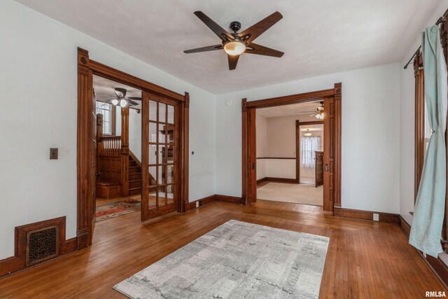 unfurnished room featuring a healthy amount of sunlight and light wood-type flooring