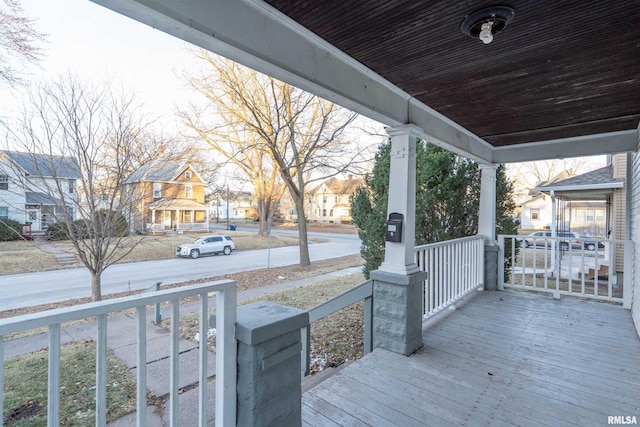 wooden terrace with covered porch