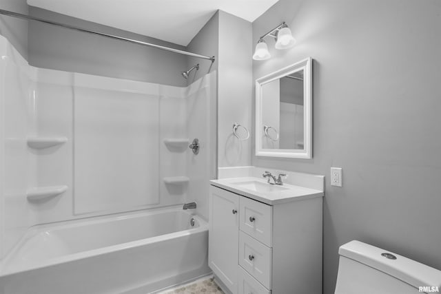 full bathroom featuring shower / tub combination, vanity, and toilet