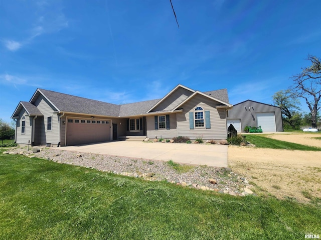 2260 260th Ave, De Witt, IA 52742 - ranch-style house with a front lawn, an attached garage, and driveway