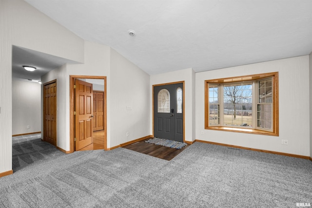 2260 260th Ave, De Witt, IA 52742 - carpeted foyer entrance with baseboards and vaulted ceiling