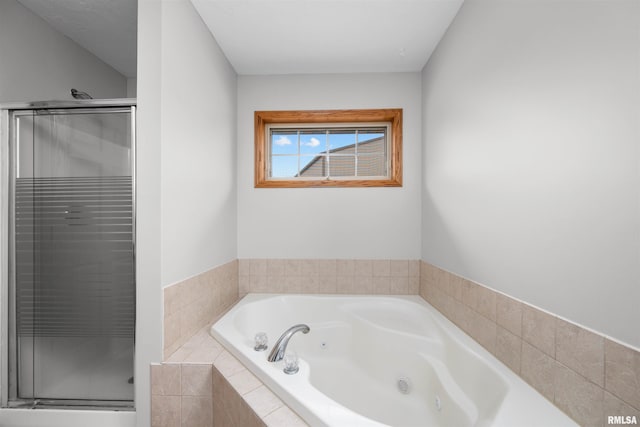 2260 260th Ave, De Witt, IA 52742 - bathroom featuring a shower stall and a jetted tub