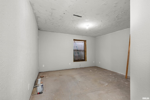 2260 260th Ave, De Witt, IA 52742 - empty room with a textured ceiling