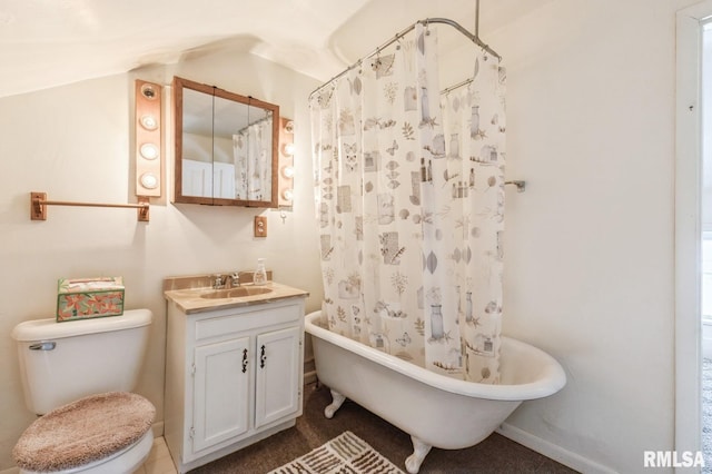 full bathroom with vanity, shower / bath combo with shower curtain, and toilet