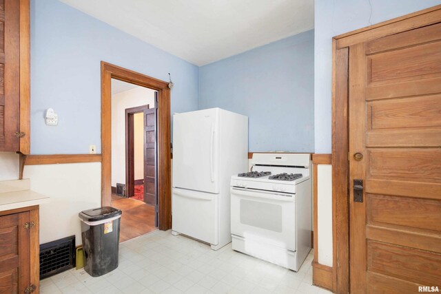 corridor with sink and a textured ceiling