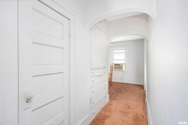 unfurnished room with crown molding, light carpet, and ceiling fan