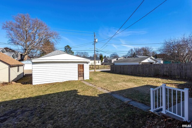 yard covered in snow featuring an outdoor structure