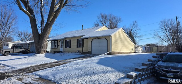 view of front of home featuring a garage