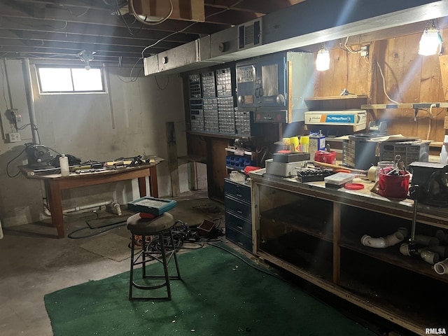 basement with a workshop area