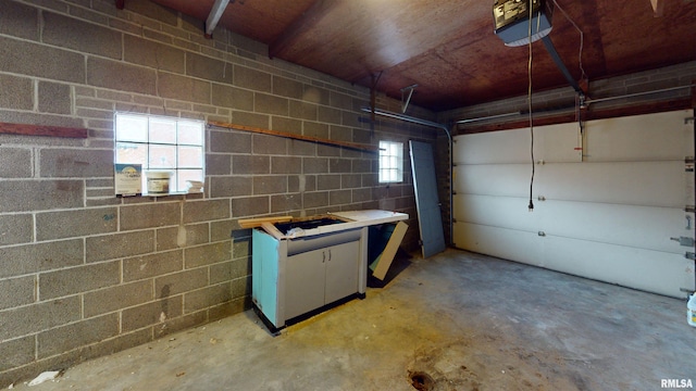 garage featuring a garage door opener