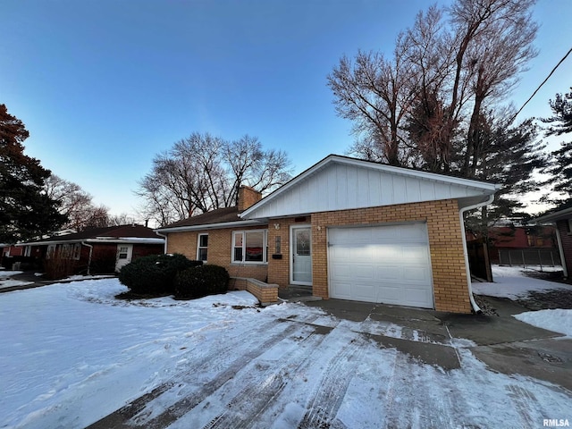 single story home featuring a garage