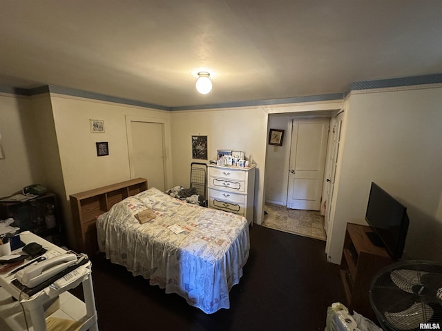 bedroom with ornamental molding