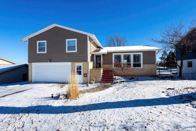 split level home with a garage