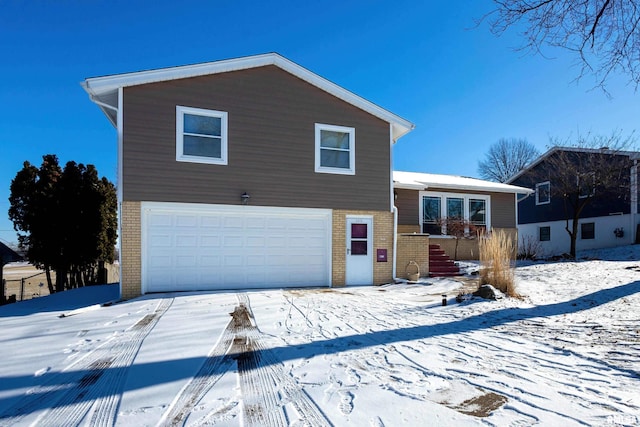 split level home featuring a garage