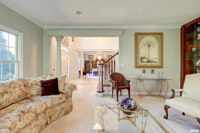 interior space with ornamental molding and decorative columns