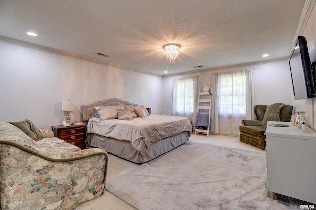 carpeted bedroom with crown molding and a textured ceiling