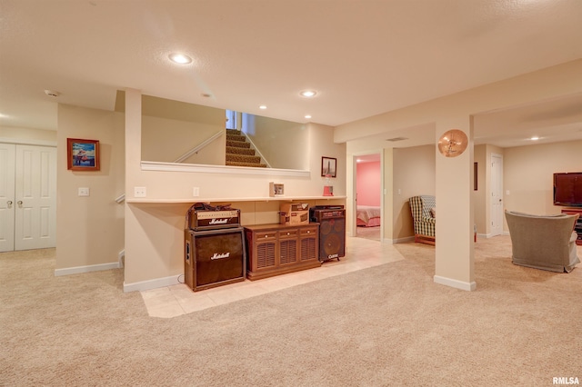 kitchen featuring light carpet