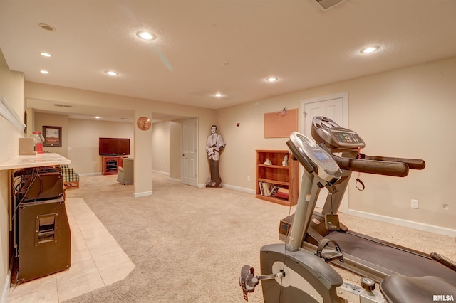 workout area with light colored carpet