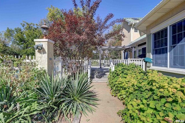 exterior space with a pergola