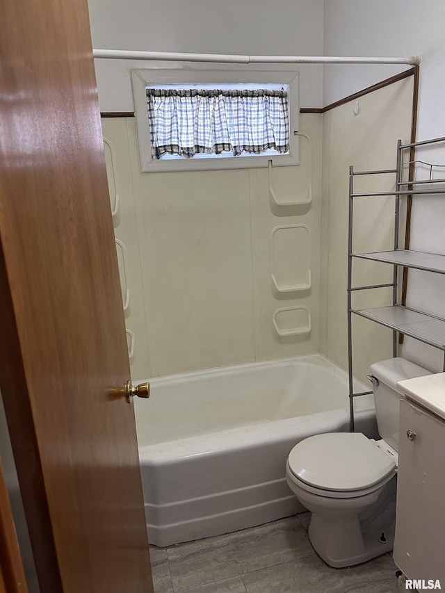 full bathroom with vanity, hardwood / wood-style floors, shower / tub combination, and toilet