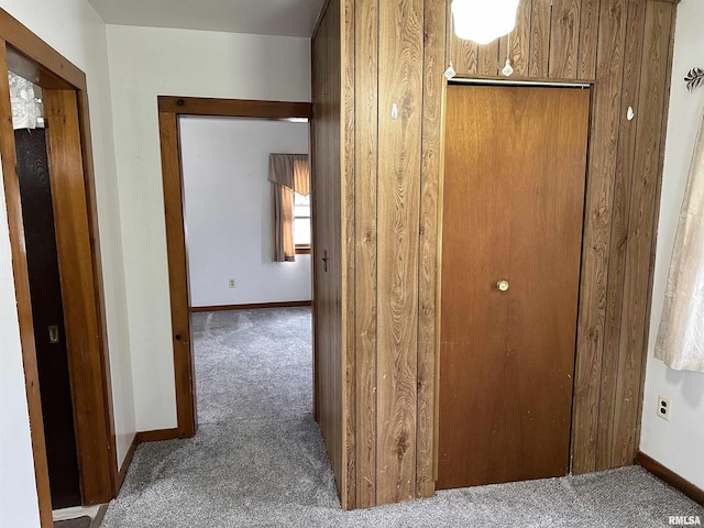 corridor featuring carpet flooring