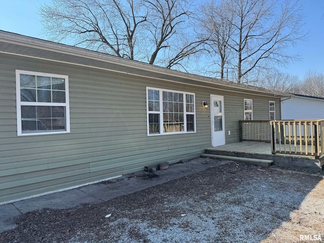 view of front of property featuring a wooden deck