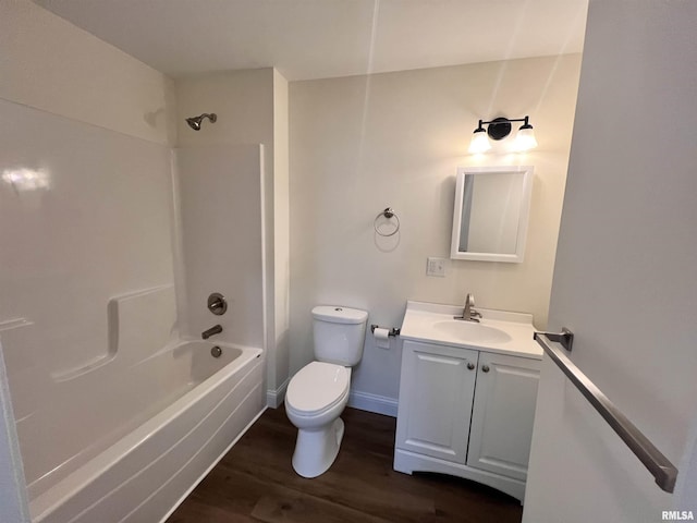 full bathroom featuring shower / bathing tub combination, vanity, wood-type flooring, and toilet