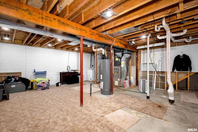 basement with gas water heater and heating unit