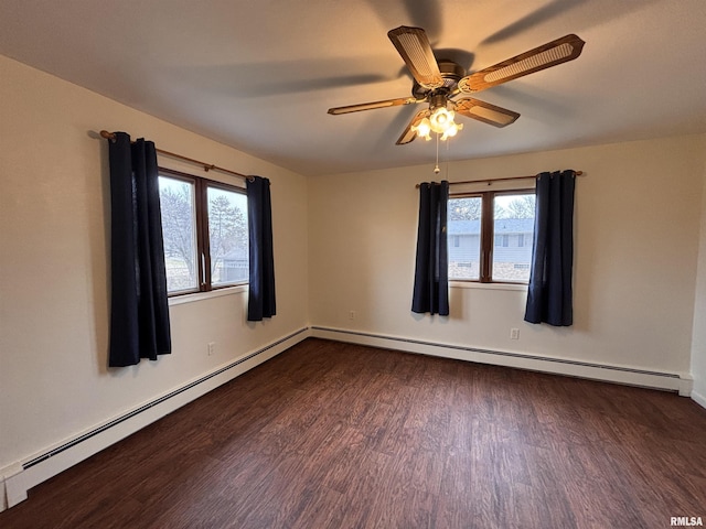 unfurnished room with ceiling fan, dark hardwood / wood-style flooring, and a baseboard radiator