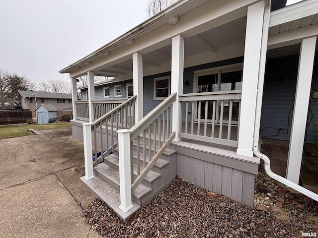 property entrance featuring covered porch