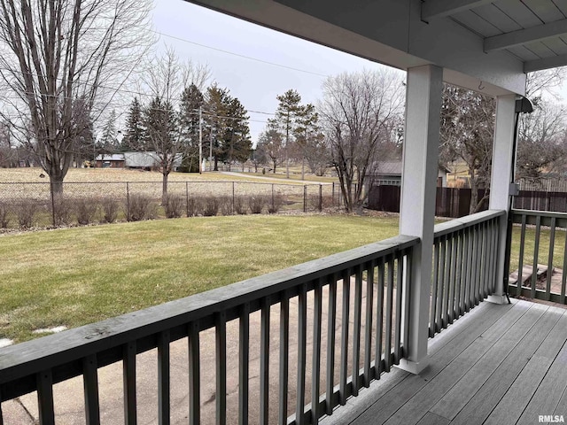 deck featuring a lawn