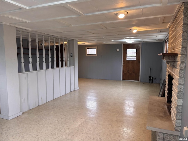 basement with a fireplace