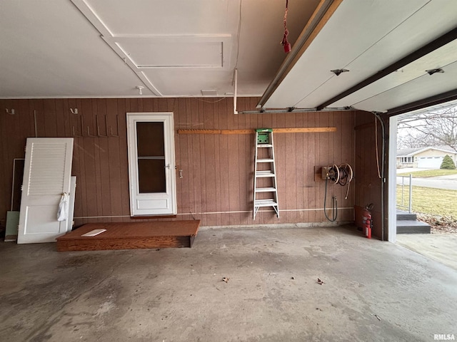 garage with wood walls