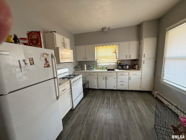 kitchen featuring sink, white appliances, dark wood-type flooring, and white cabinets