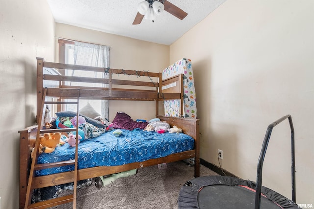bedroom with carpet floors, a textured ceiling, and ceiling fan