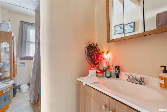 bathroom with vanity and tile patterned floors
