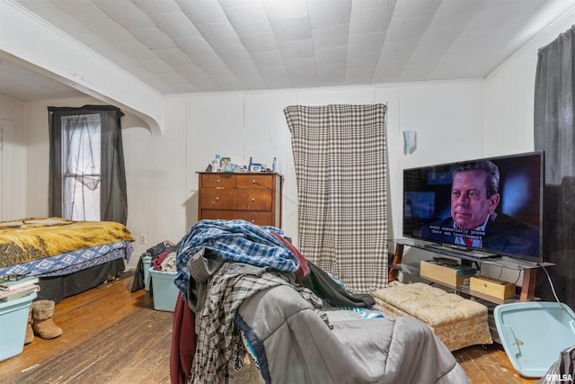 bedroom featuring wood-type flooring