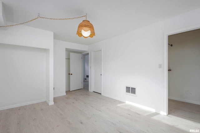 interior space with light hardwood / wood-style flooring