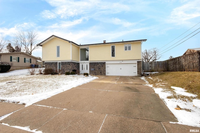 view of front of property with a garage