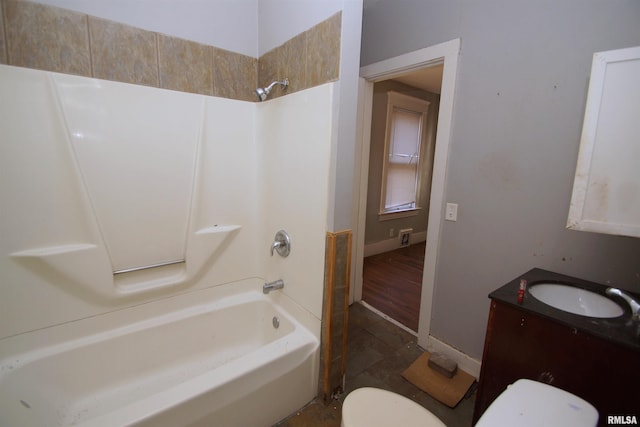 full bathroom with shower / bathing tub combination, vanity, and toilet