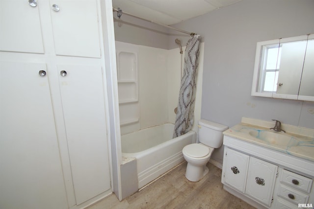 full bathroom with hardwood / wood-style flooring, vanity, shower / bath combination with curtain, and toilet