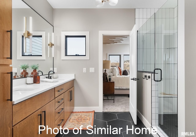 bathroom featuring vanity, tile patterned floors, and walk in shower