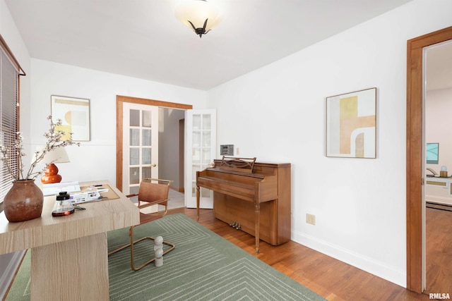 interior space featuring hardwood / wood-style flooring and french doors