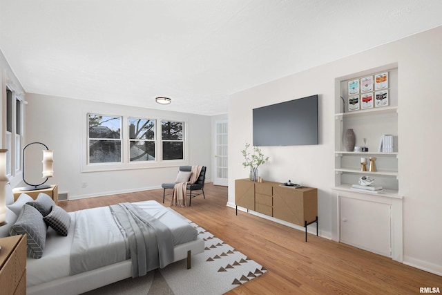 bedroom featuring hardwood / wood-style flooring