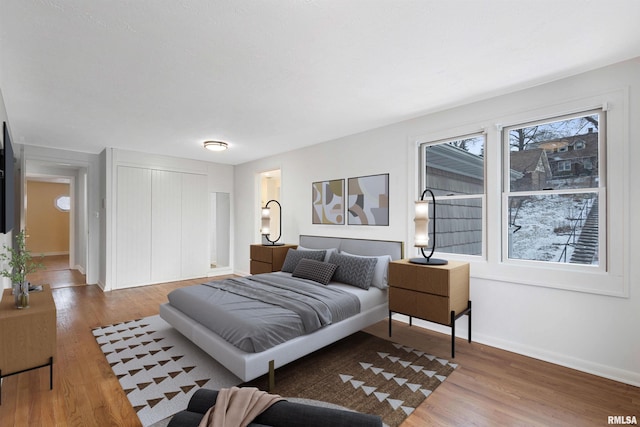 bedroom featuring hardwood / wood-style flooring