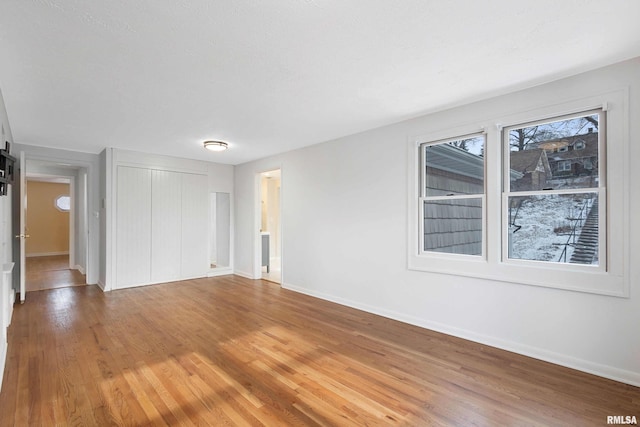 interior space with hardwood / wood-style flooring