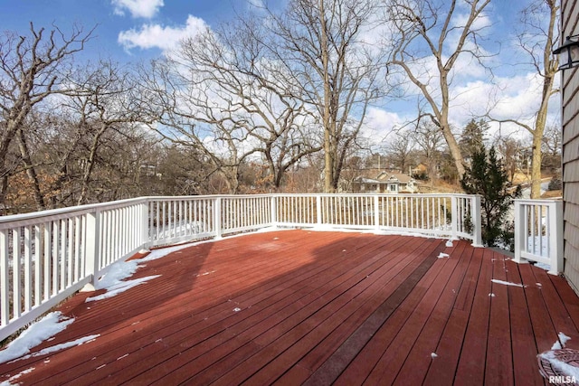 view of snow covered deck