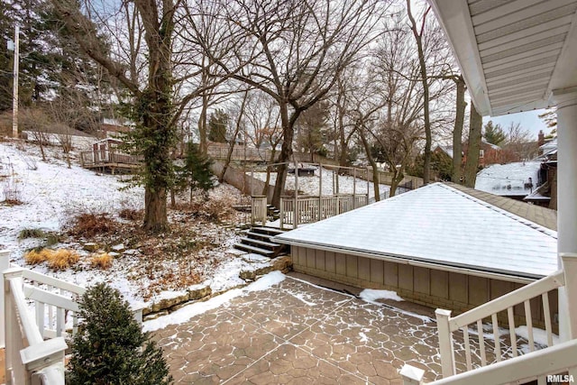 view of yard layered in snow