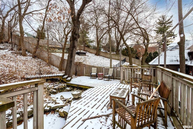 view of snow covered deck