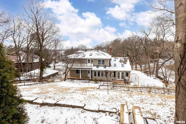 view of snow covered property